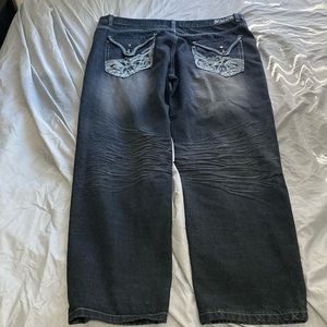 Baggy embroidered faded jeans